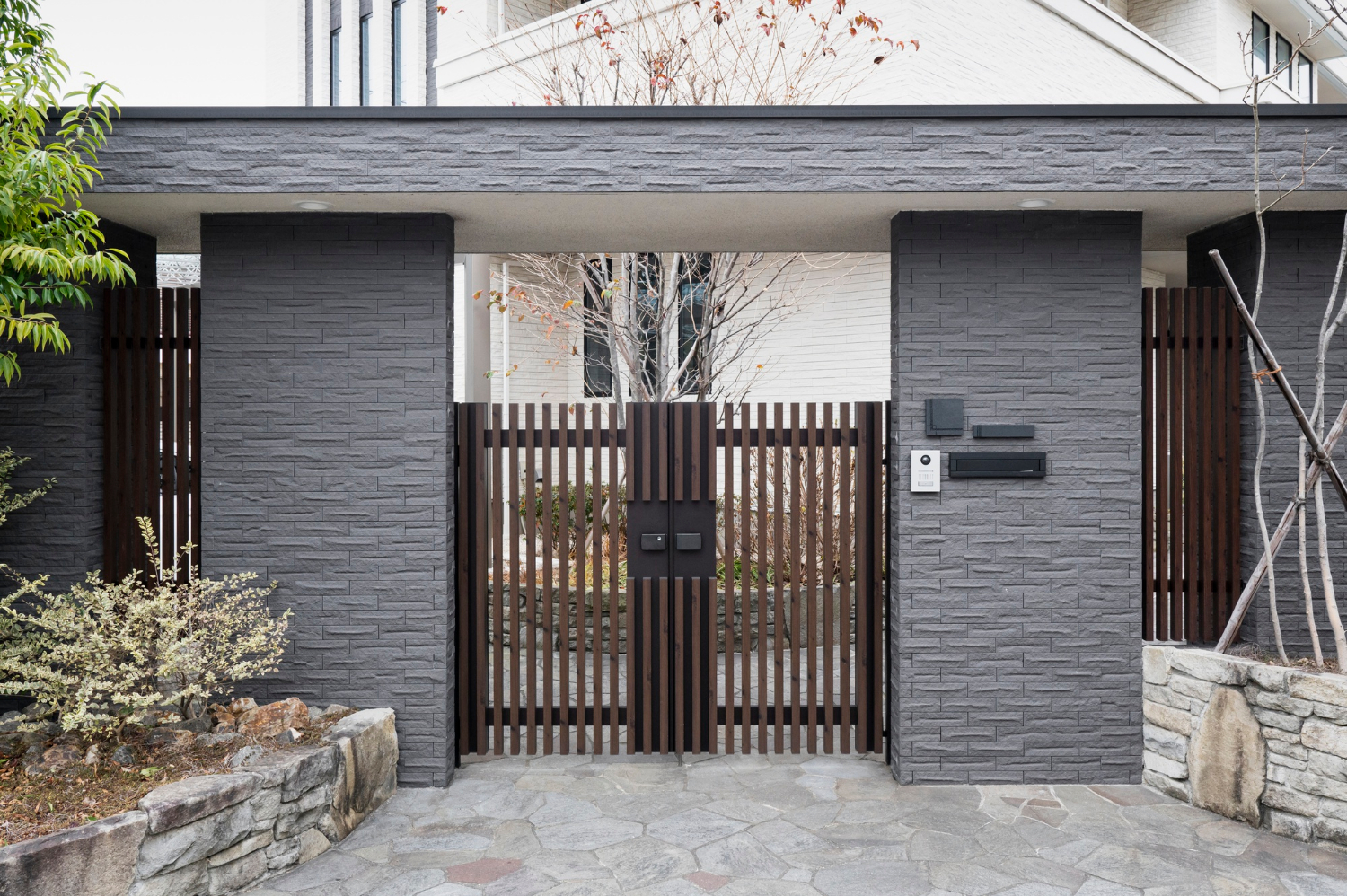 japanese house entrance with fence
